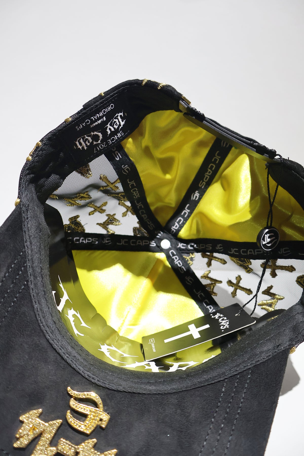 CROSS ICED OUT GOLD TRUCKER HAT