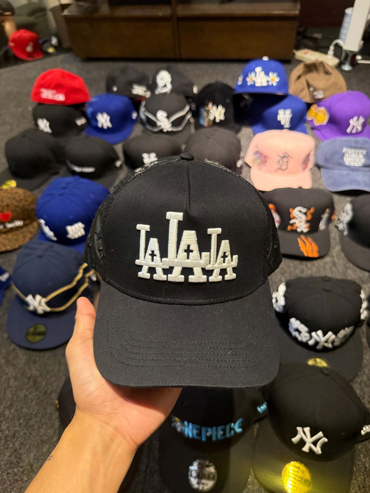 LA RUDE AWAKENINGS TRUCKER HAT