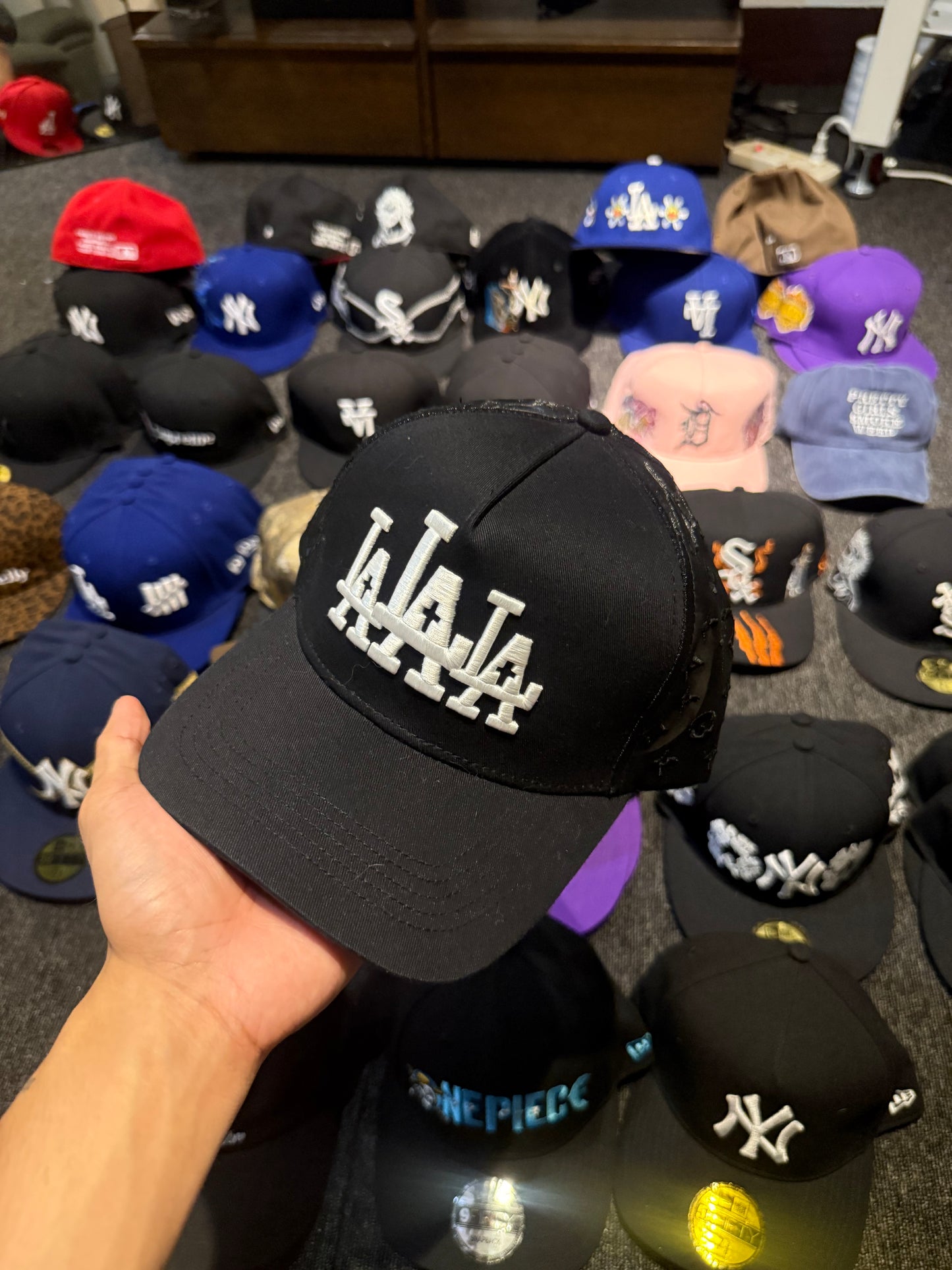 LA RUDE AWAKENINGS TRUCKER HAT