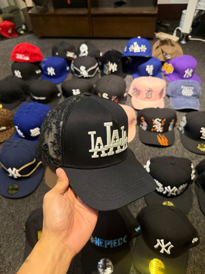 LA RUDE AWAKENINGS TRUCKER HAT