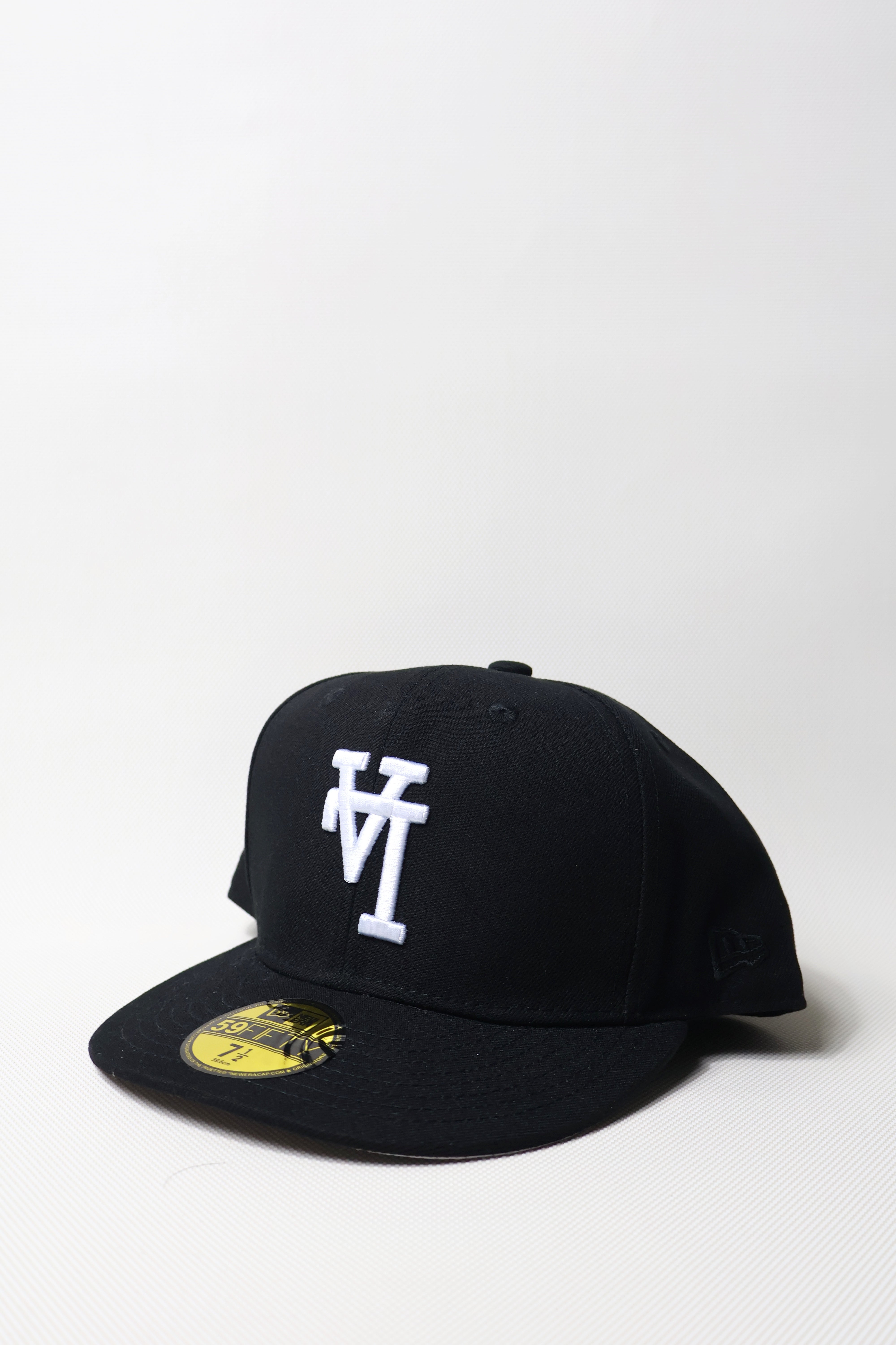 LA REVERSE LOGO BLACK – FIRECAPS