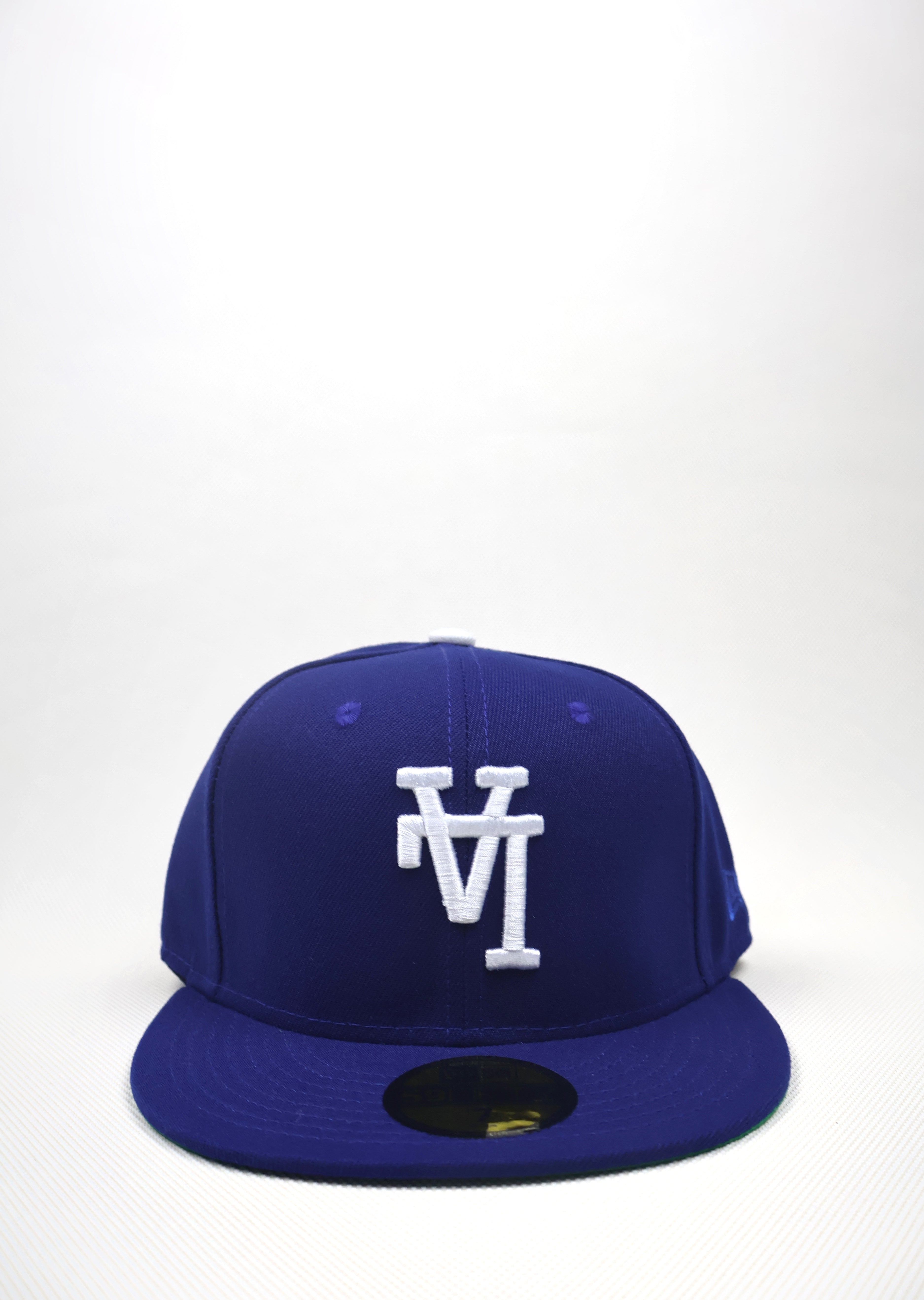 LA REVERSE LOGO BLUE FITTED HAT – FIRECAPS