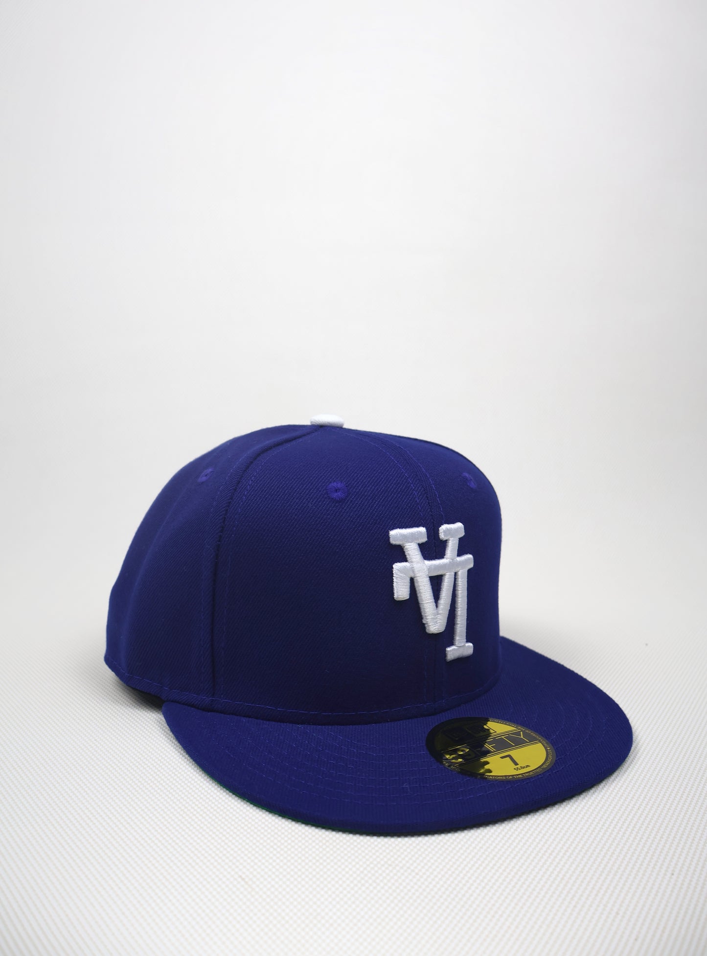 LA REVERSE LOGO BLUE FITTED HAT
