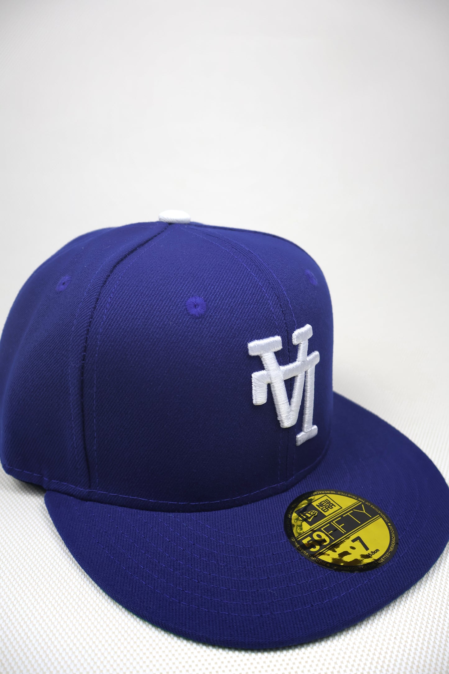 LA REVERSE LOGO BLUE FITTED HAT