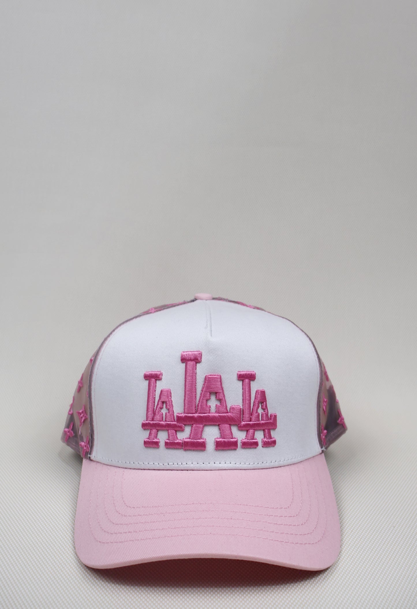 LA TRIPLE CROSS PINK TRUCKER HAT