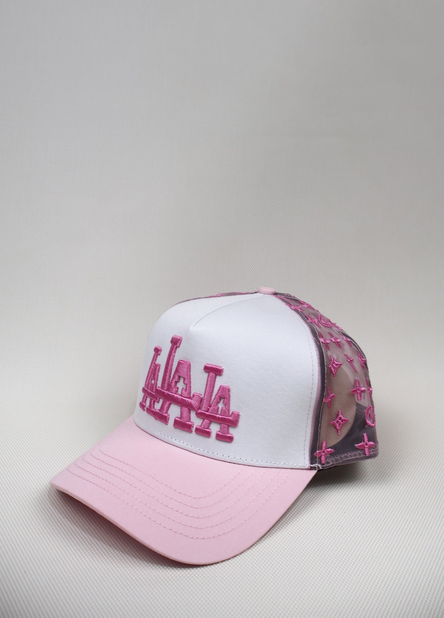 LA TRIPLE CROSS PINK TRUCKER HAT