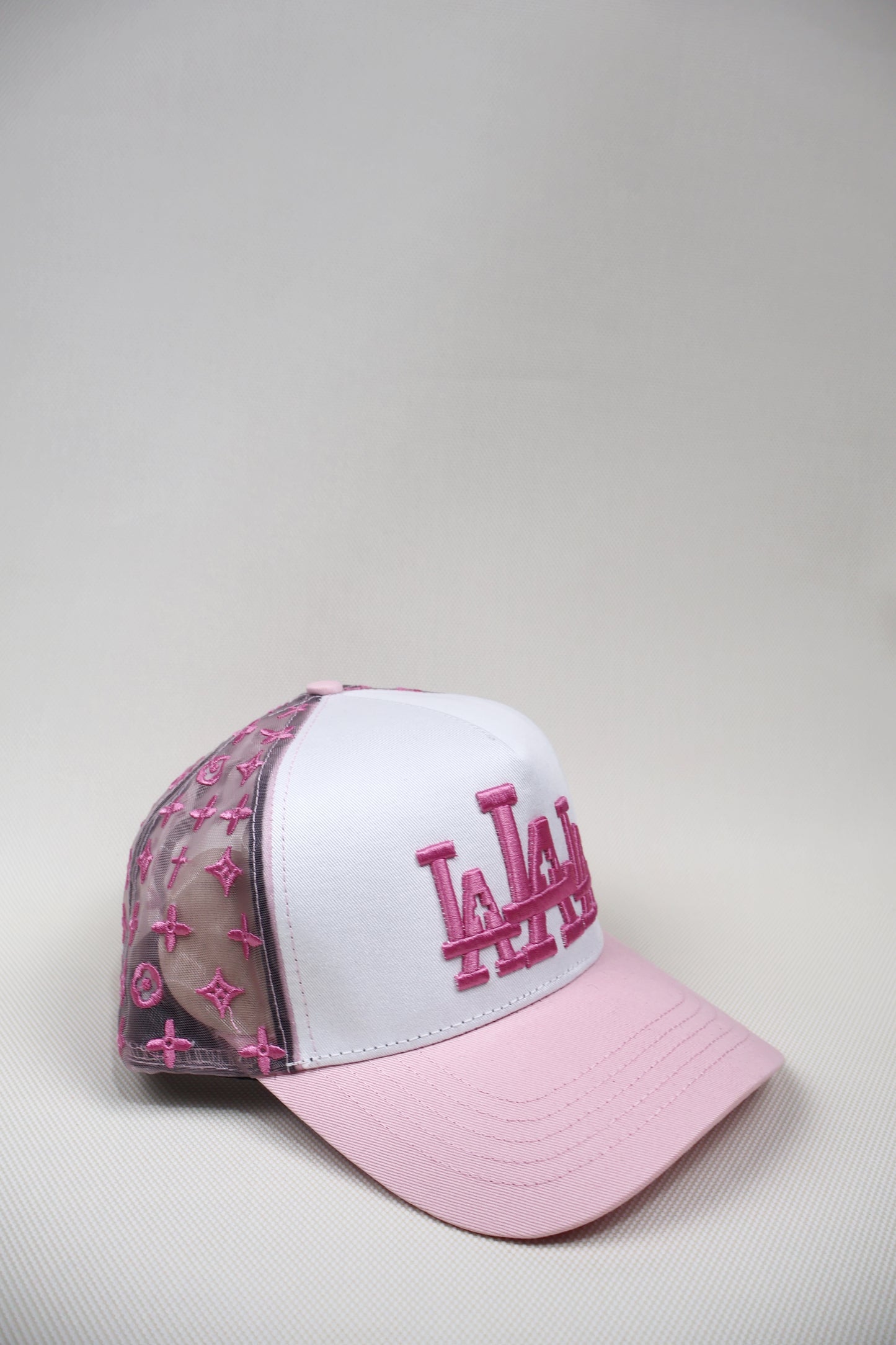 LA TRIPLE CROSS PINK TRUCKER HAT