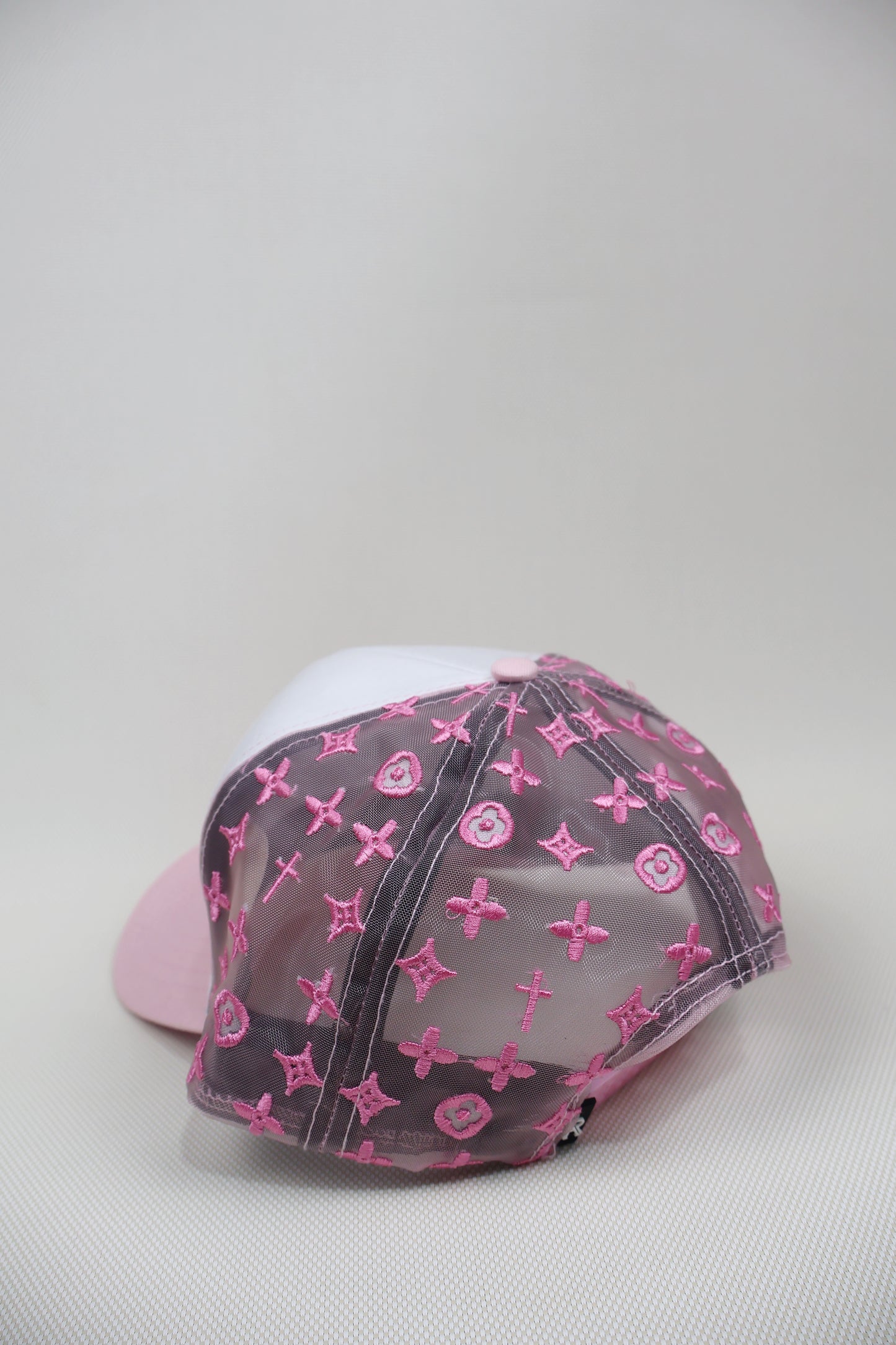 LA TRIPLE CROSS PINK TRUCKER HAT