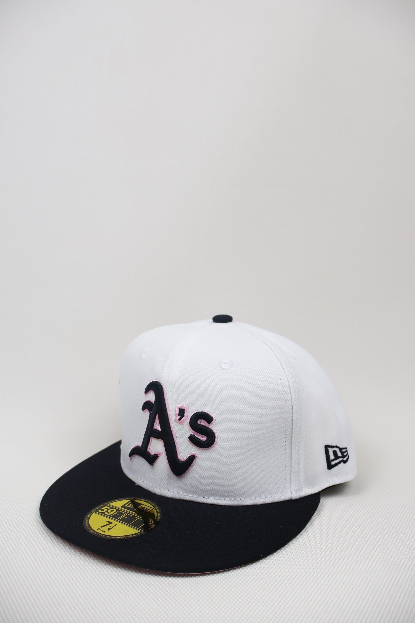 A TWO TONE PINK UB FITTED HAT