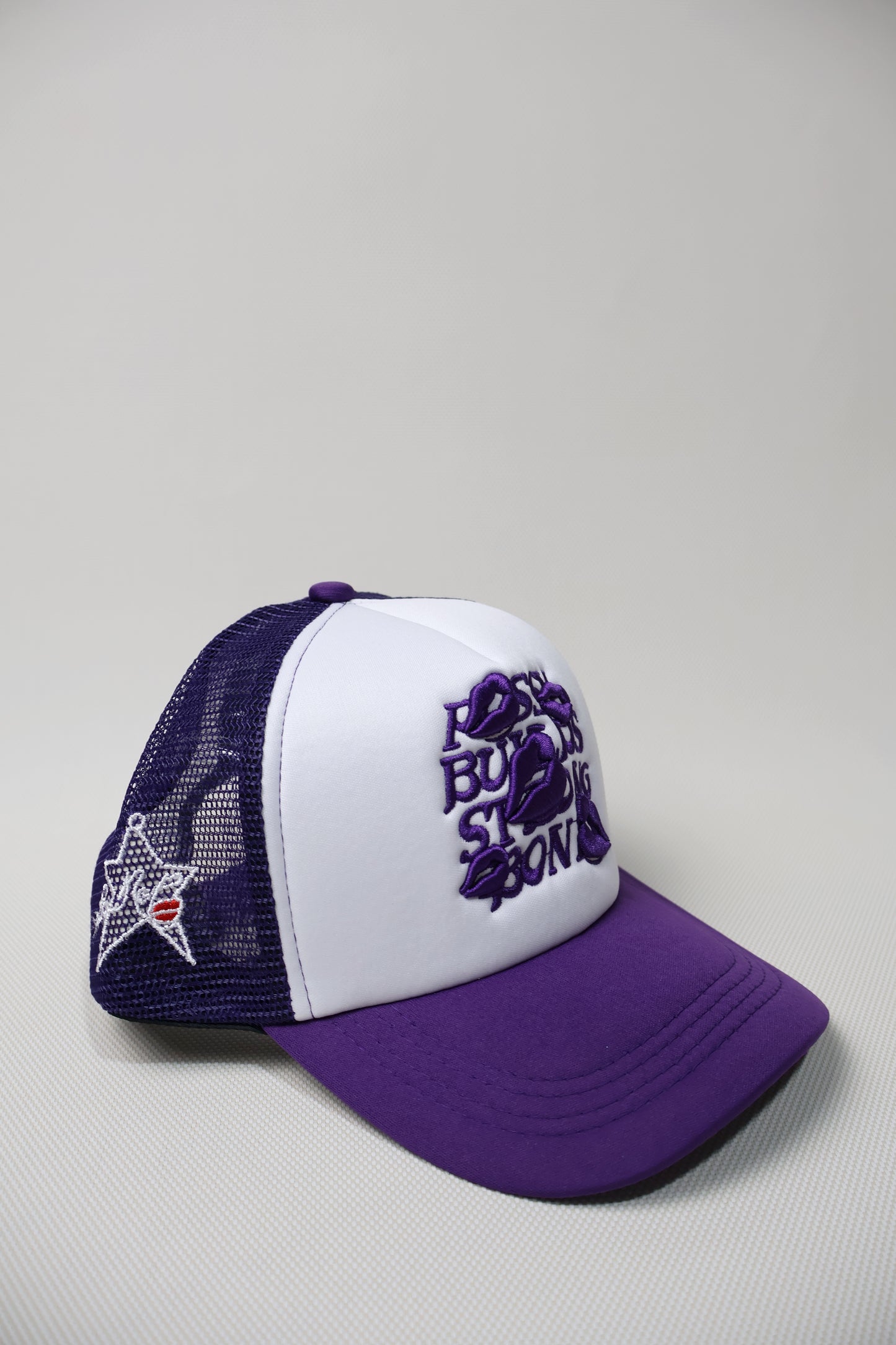 LA ROPA PURPLE TRUCKER HAT