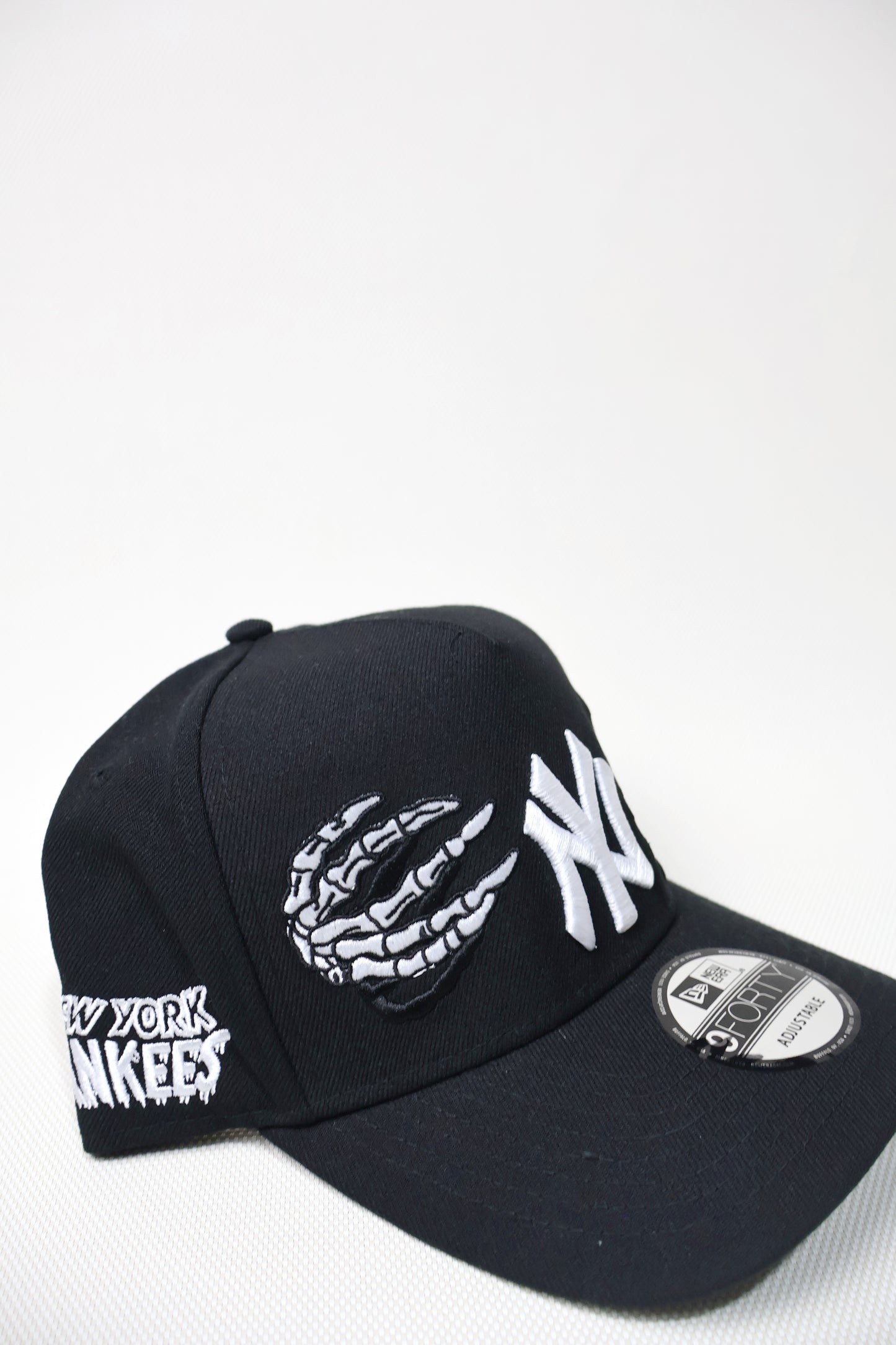 NY BONES SNAPBACK HAT