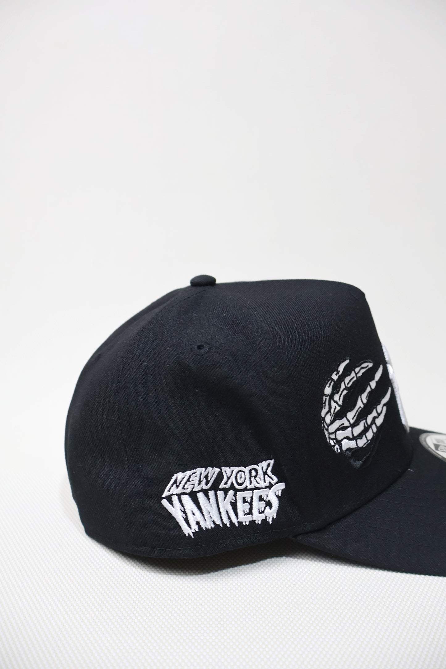 NY BONES SNAPBACK HAT