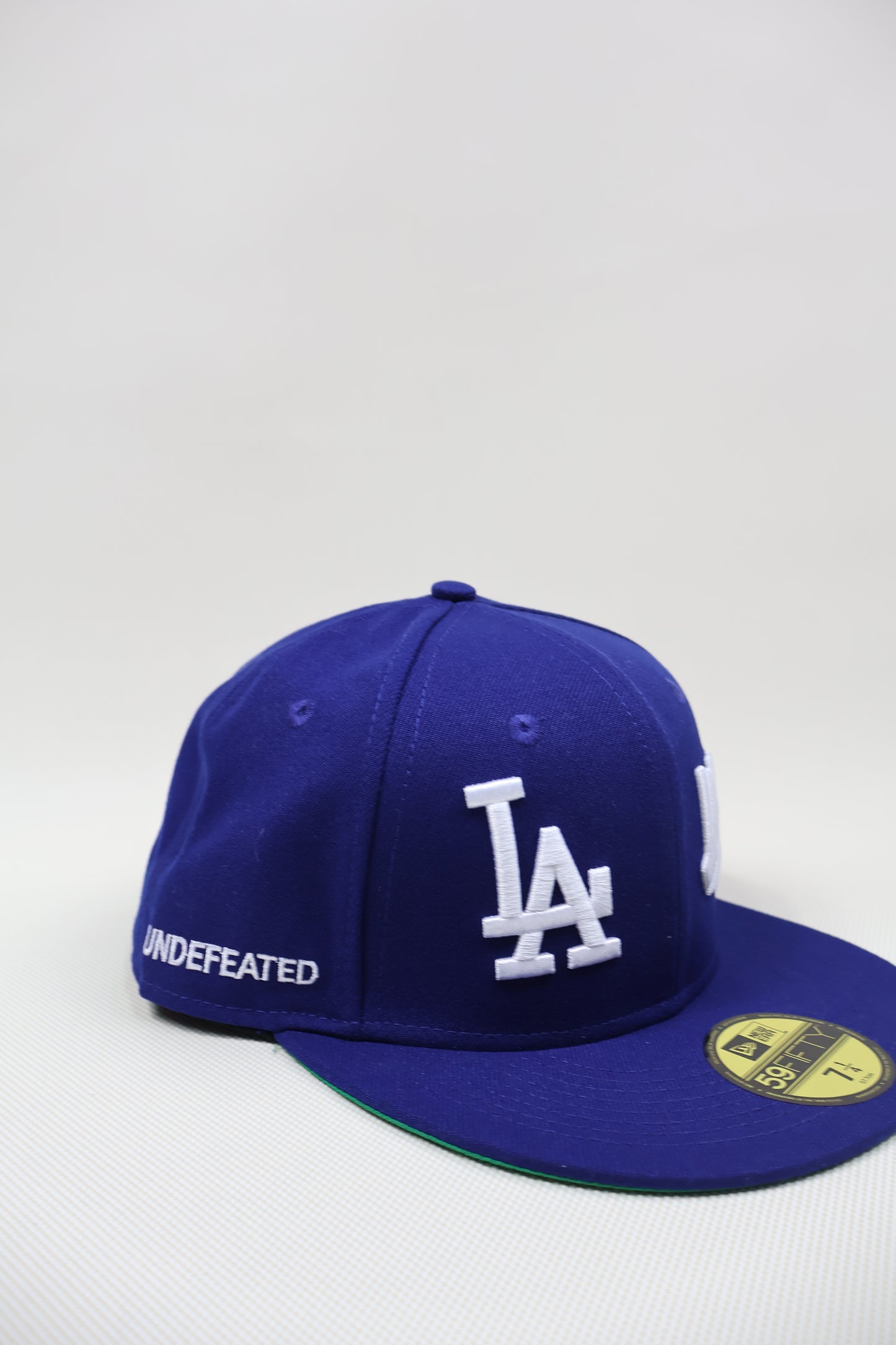 LA X UNDEFEATED BLUE FITTED HAT