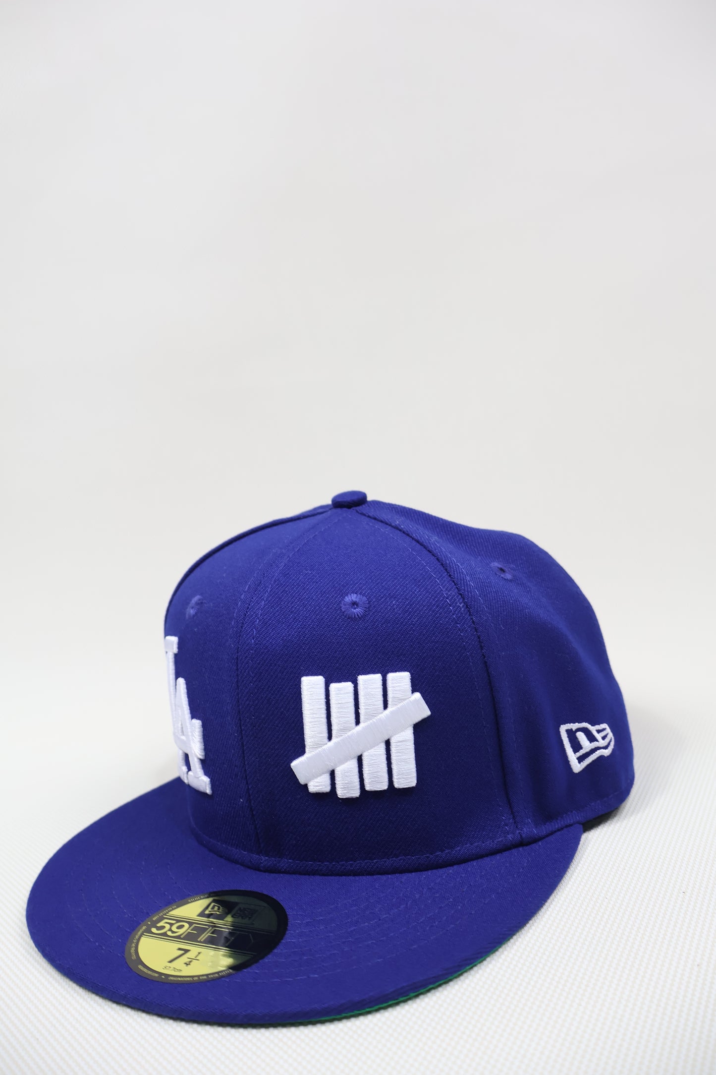 LA X UNDEFEATED BLUE FITTED HAT