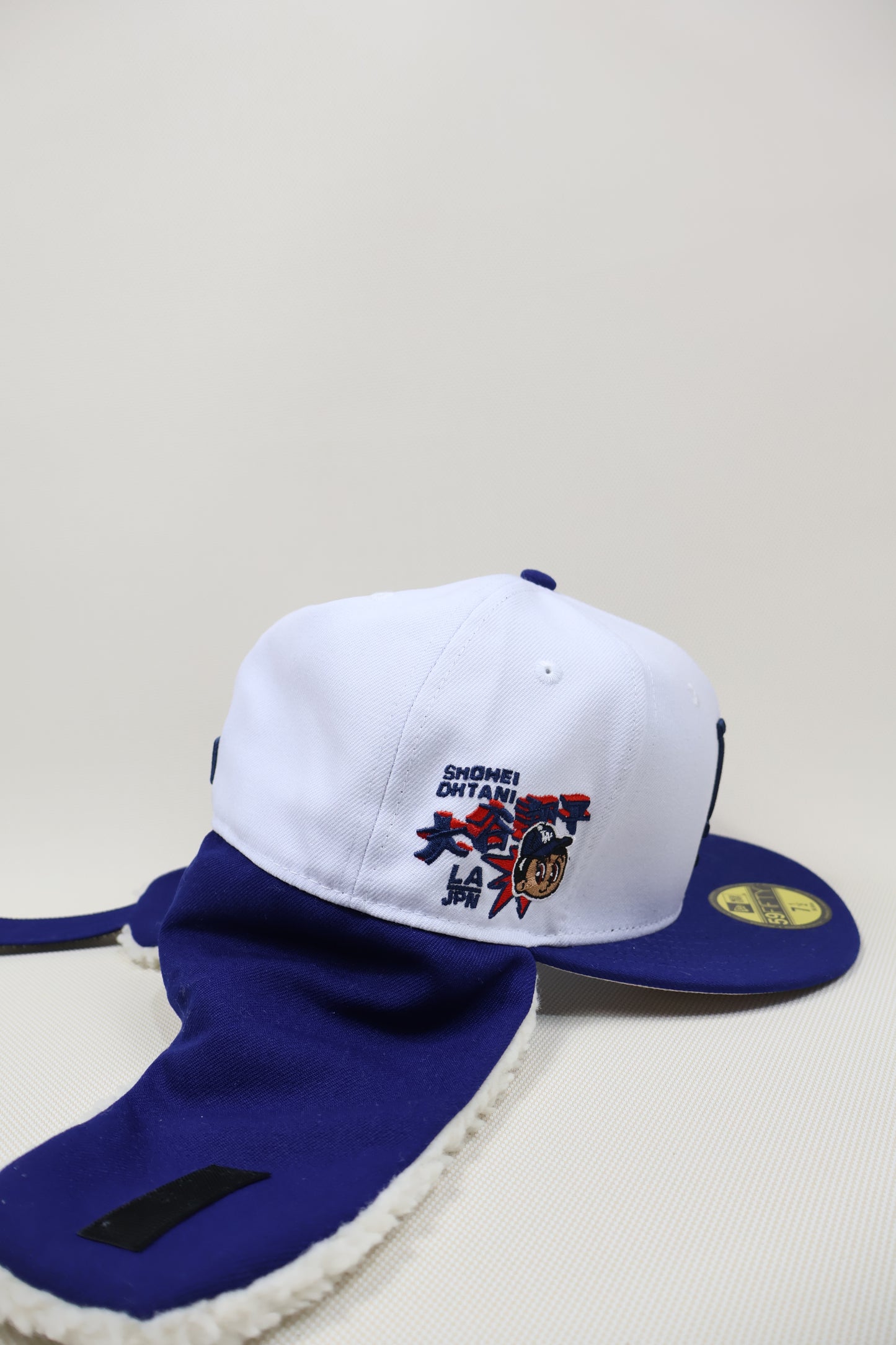 LA SNOW EAR MUFFS FITTED HAT