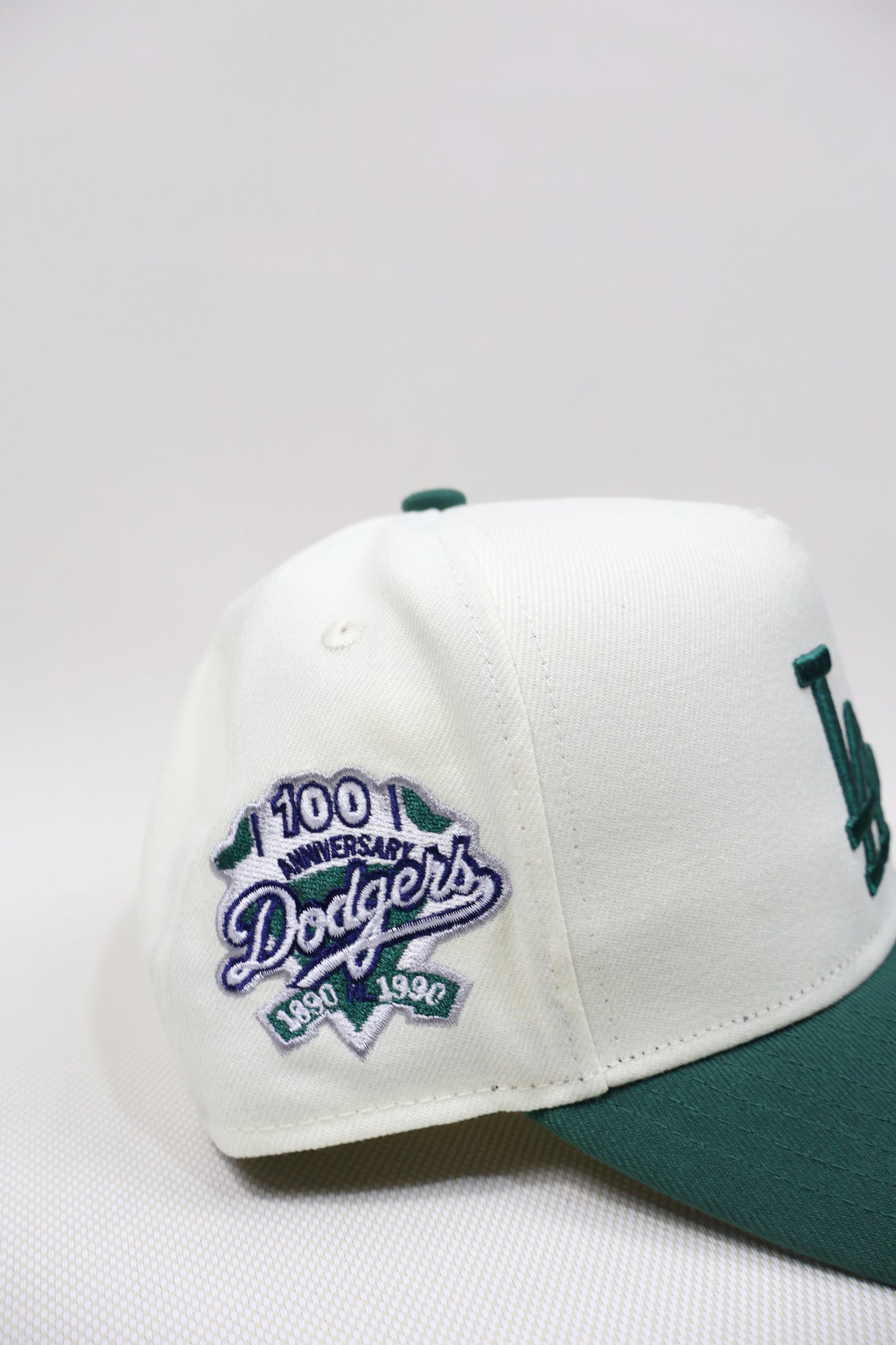 LA TWO TONE GREEN A FRAME FITTED HAT
