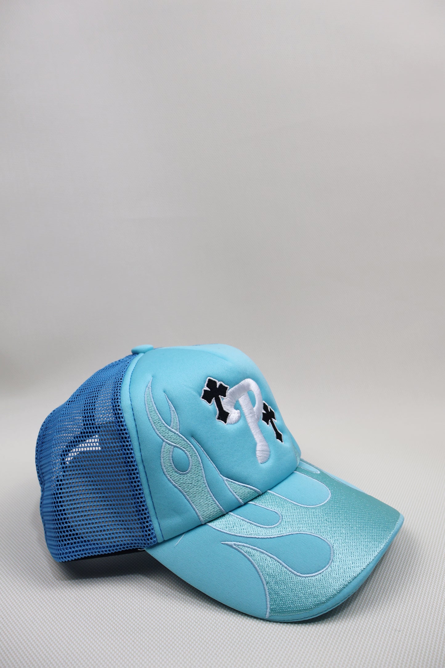 P BABY BLUE FLAMES TRUCKER HAT