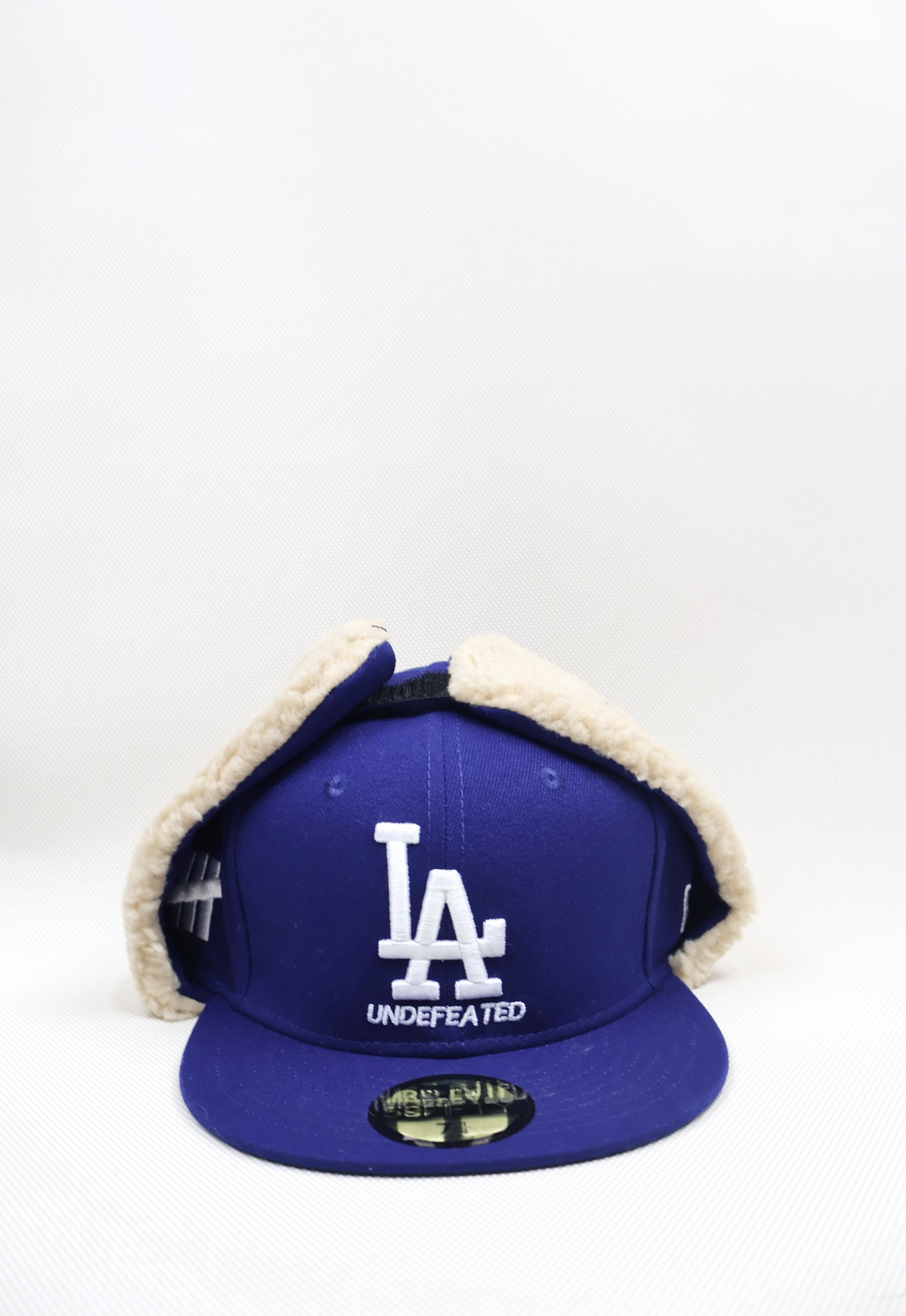 LA UNDEFEATED EAR MUFFS FITTED HAT