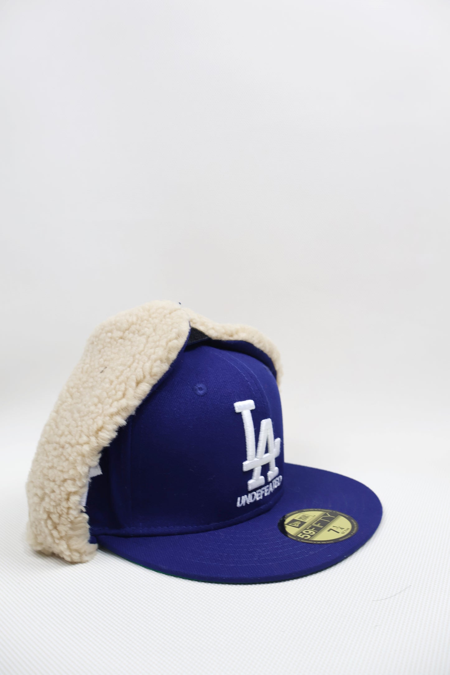 LA UNDEFEATED EAR MUFFS FITTED HAT