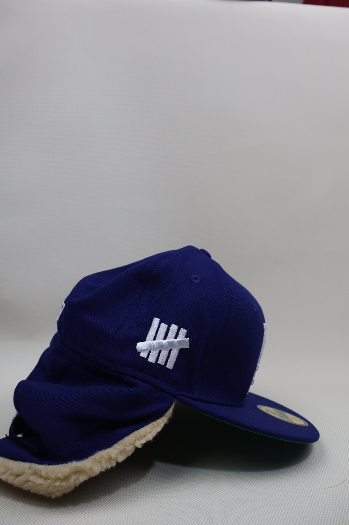 LA UNDEFEATED EAR MUFFS FITTED HAT