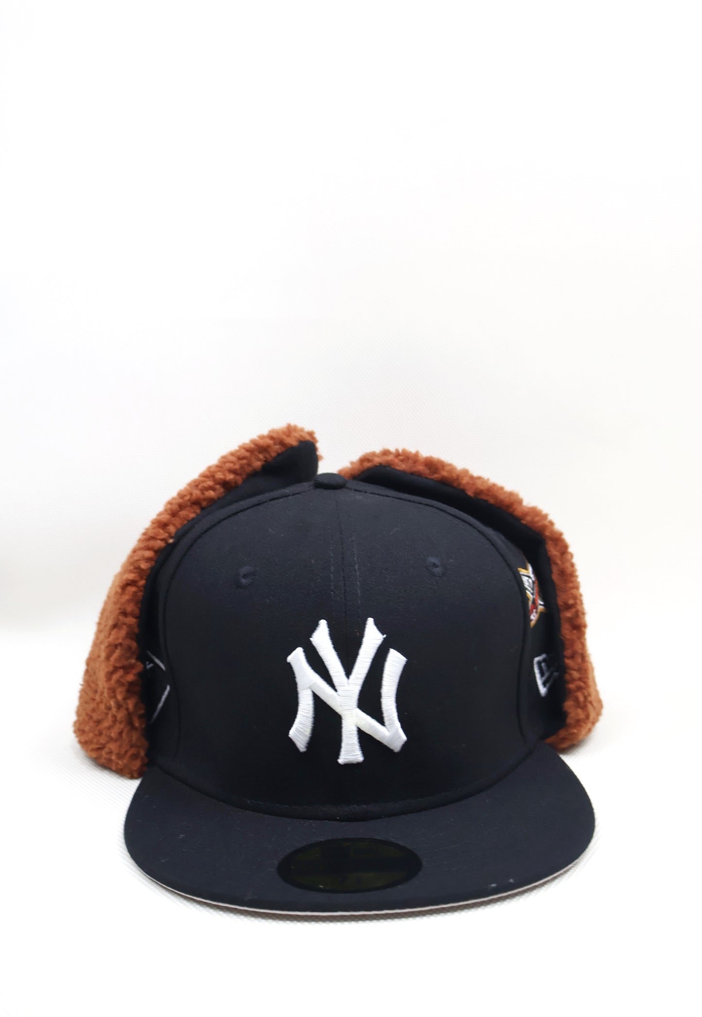 NY MULTI PATCH EAR MUFFS FITTED HAT