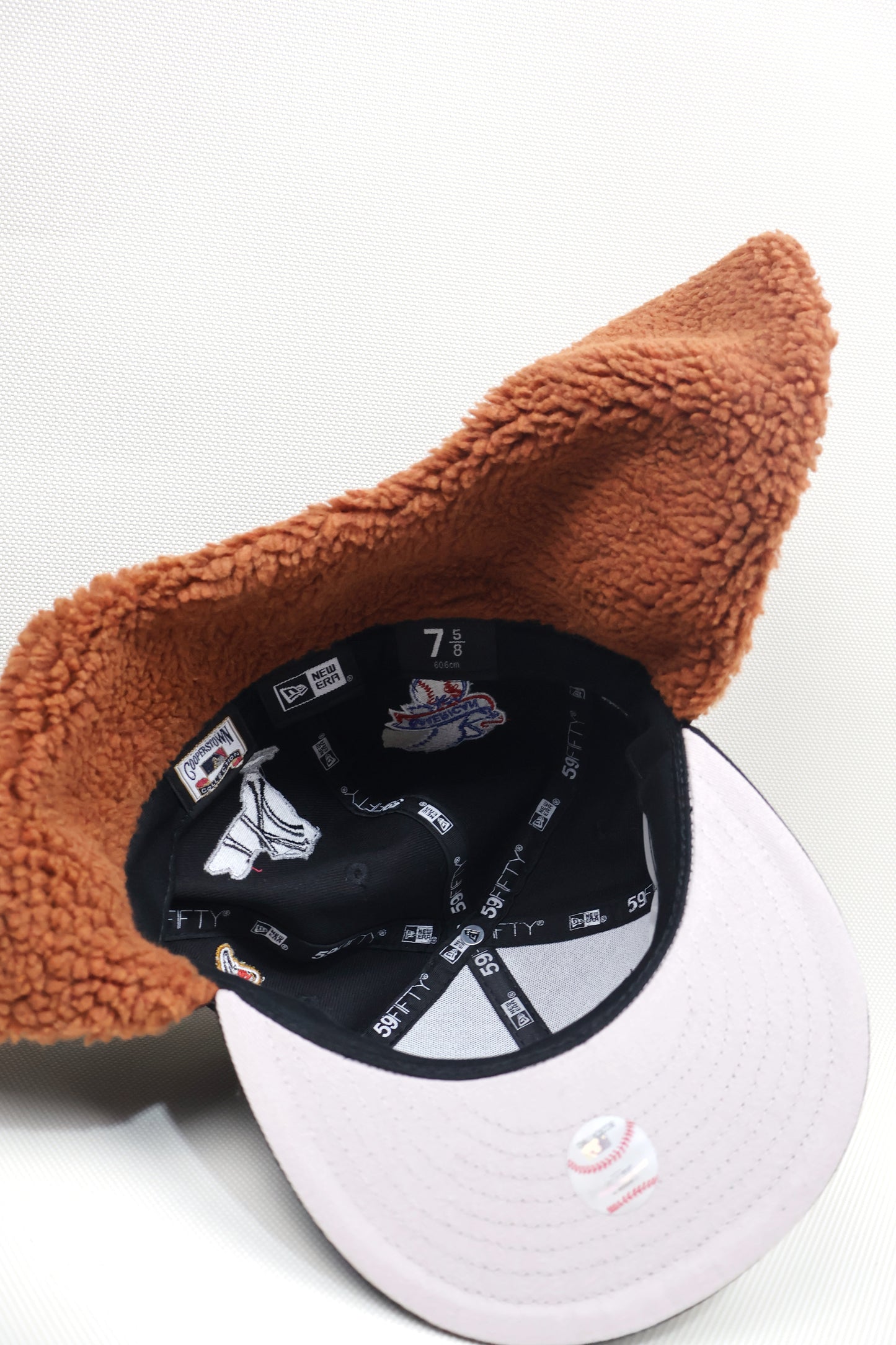 NY MULTI PATCH EAR MUFFS FITTED HAT