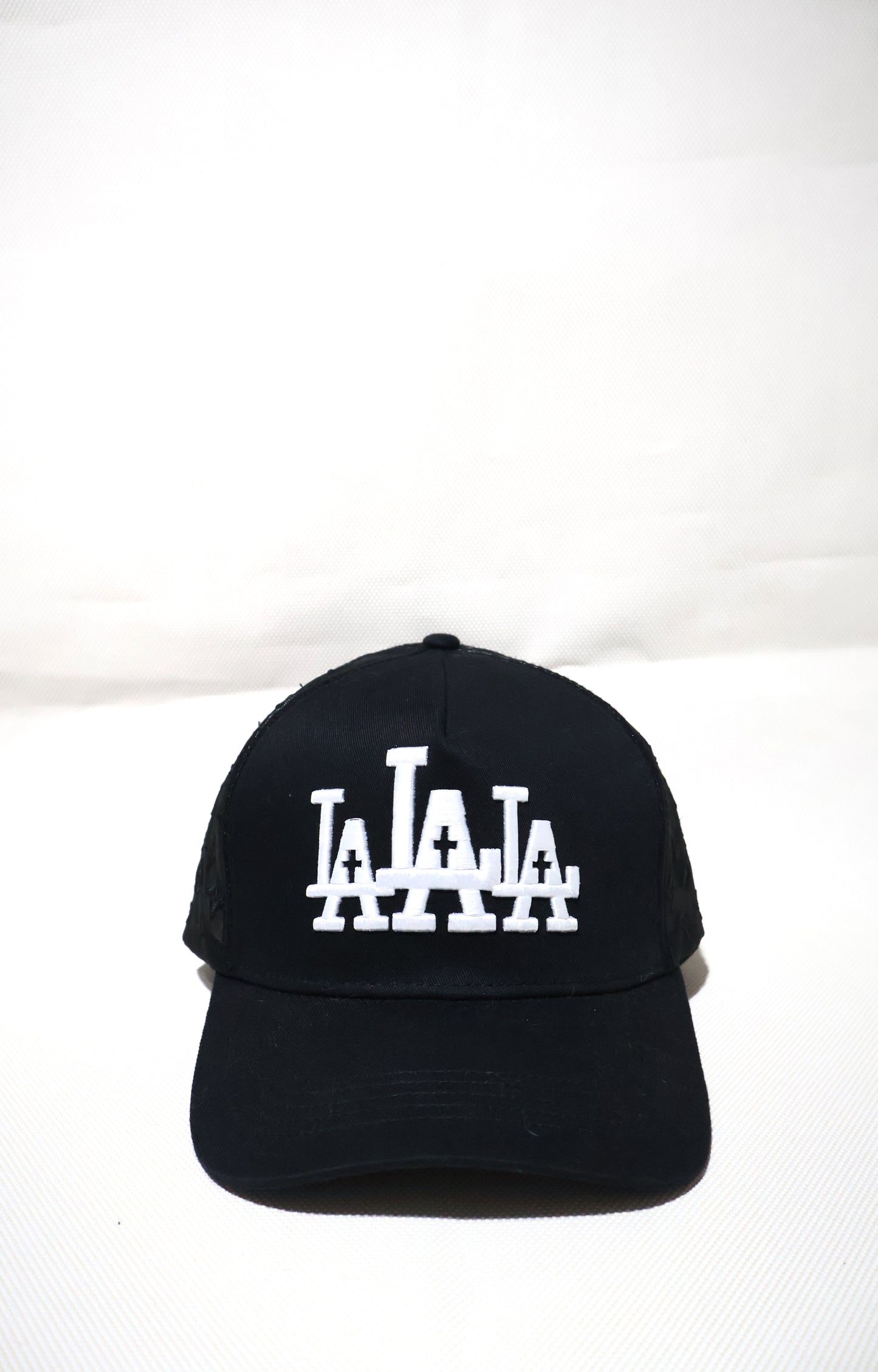 LA RUDE AWAKENINGS TRUCKER HAT