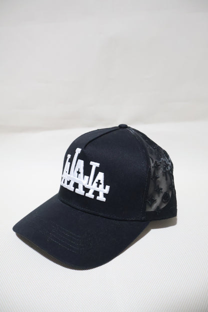 LA RUDE AWAKENINGS TRUCKER HAT