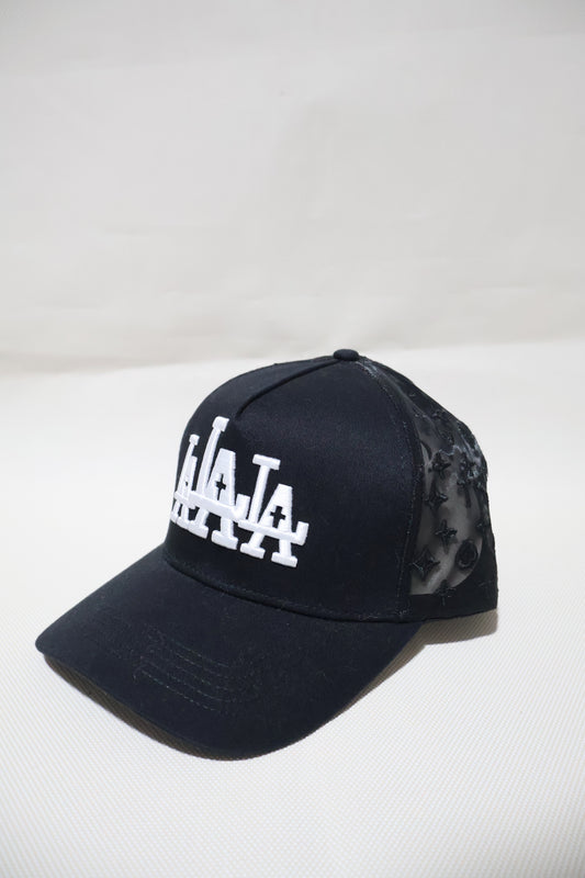 LA RUDE AWAKENINGS TRUCKER HAT