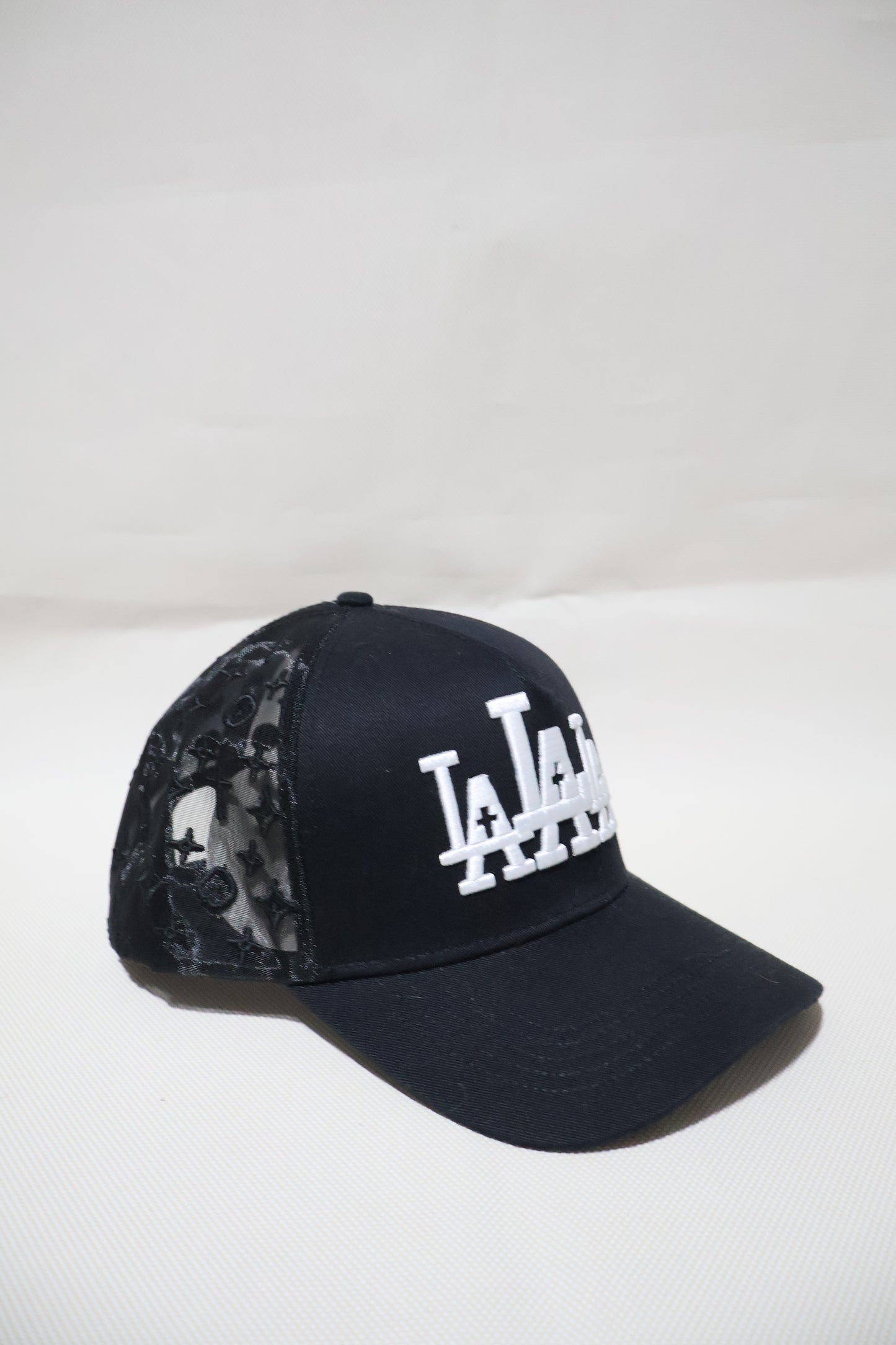 LA RUDE AWAKENINGS TRUCKER HAT