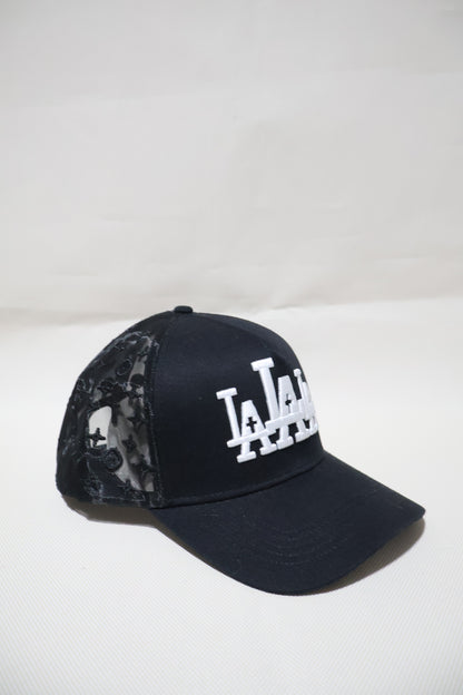 LA RUDE AWAKENINGS TRUCKER HAT