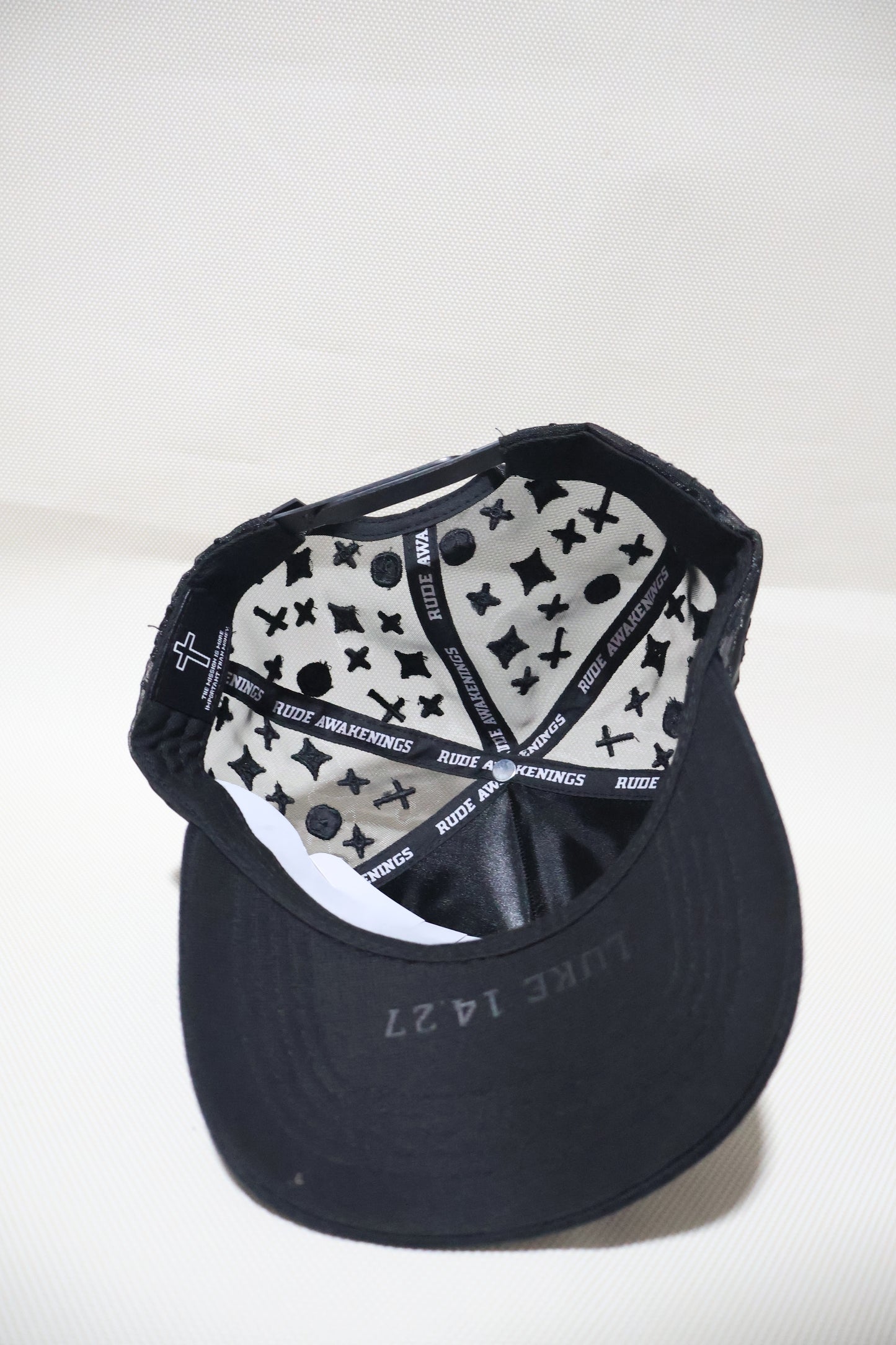 LA RUDE AWAKENINGS TRUCKER HAT