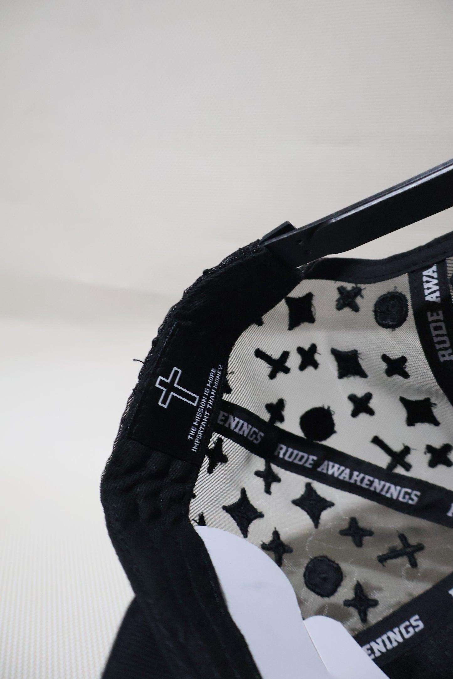 LA RUDE AWAKENINGS TRUCKER HAT
